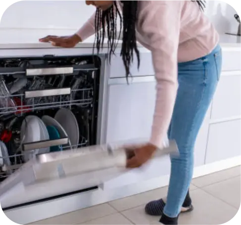 Testimonial from Charlie, affected by x-linked retinitis pigmentosa (XLRP) daily, pictured opening the dishwasher