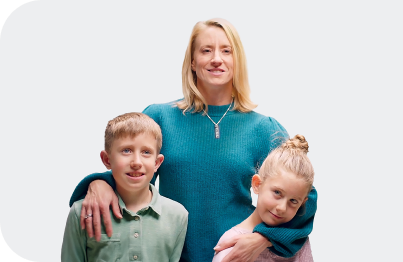 Allison, mom of children living with an inherited retinal disease (IRD), posing with her children